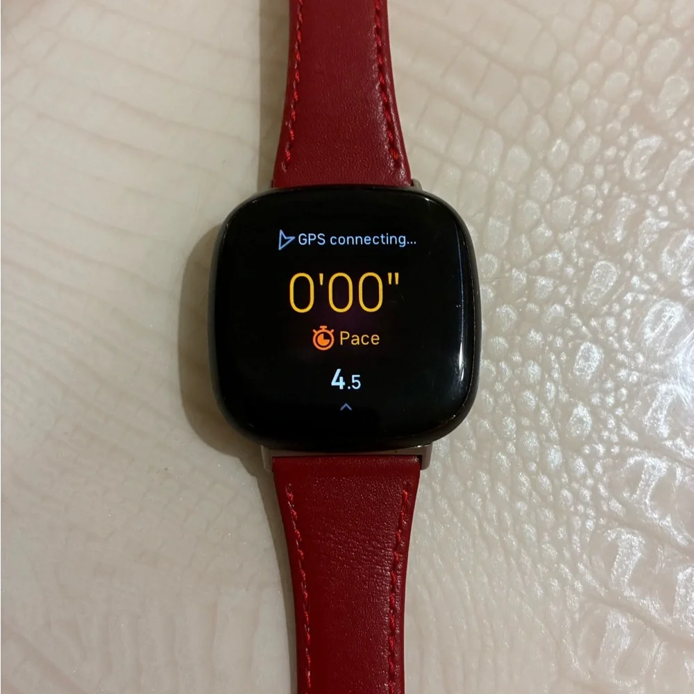 Fitbit Smartwatch with Red Strap